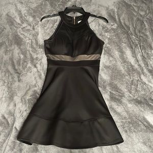 A black luxurious dress zip up.